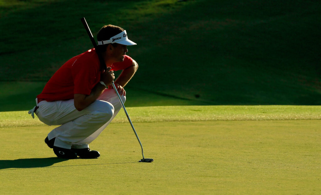 Keegan Bradley lines up a putt during the 2011 PGA Championship
