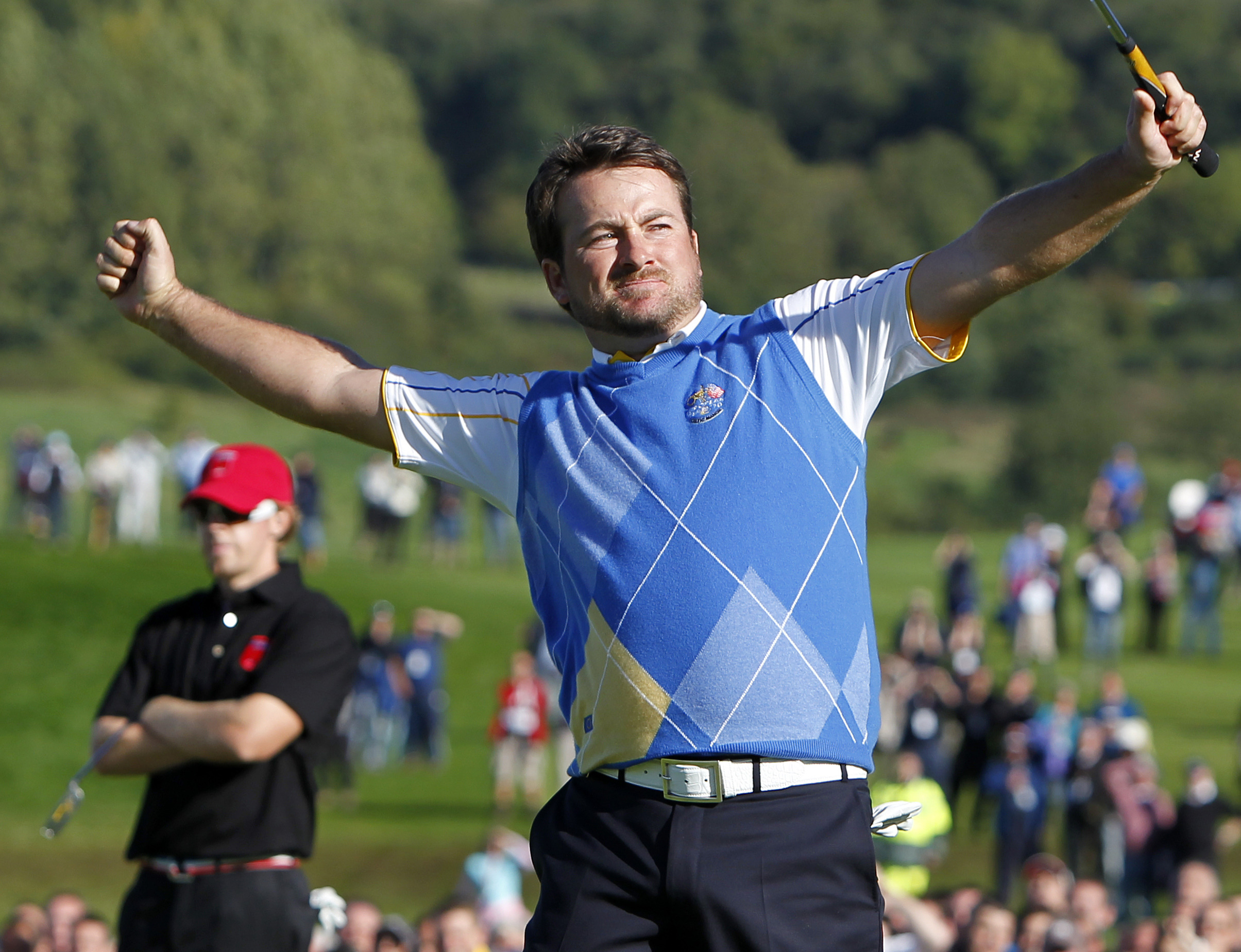 Graeme McDowell celebrates after beating Hunter Mahan at the 2010 Ryder Cup