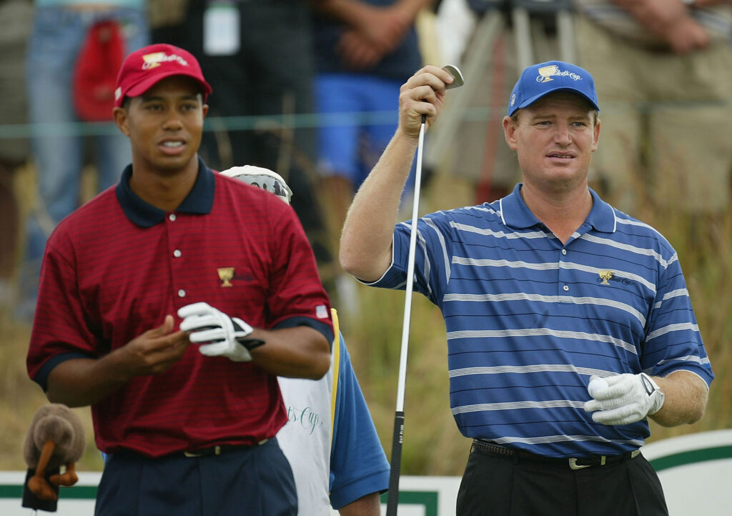 Tiger Woods and Ernie Els stand on the tee during the final day of the 2003 Presidents Cup
