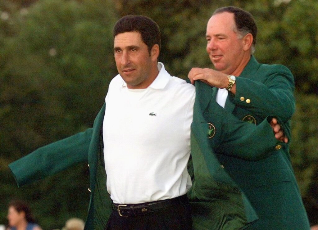 1999 Masters Champion Jose Maria Olazabal (R) of S