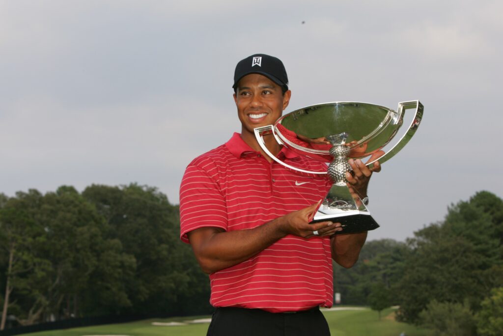 Tiger Woods holds the FedExCup trophy after winning the 2007 Tour Championship