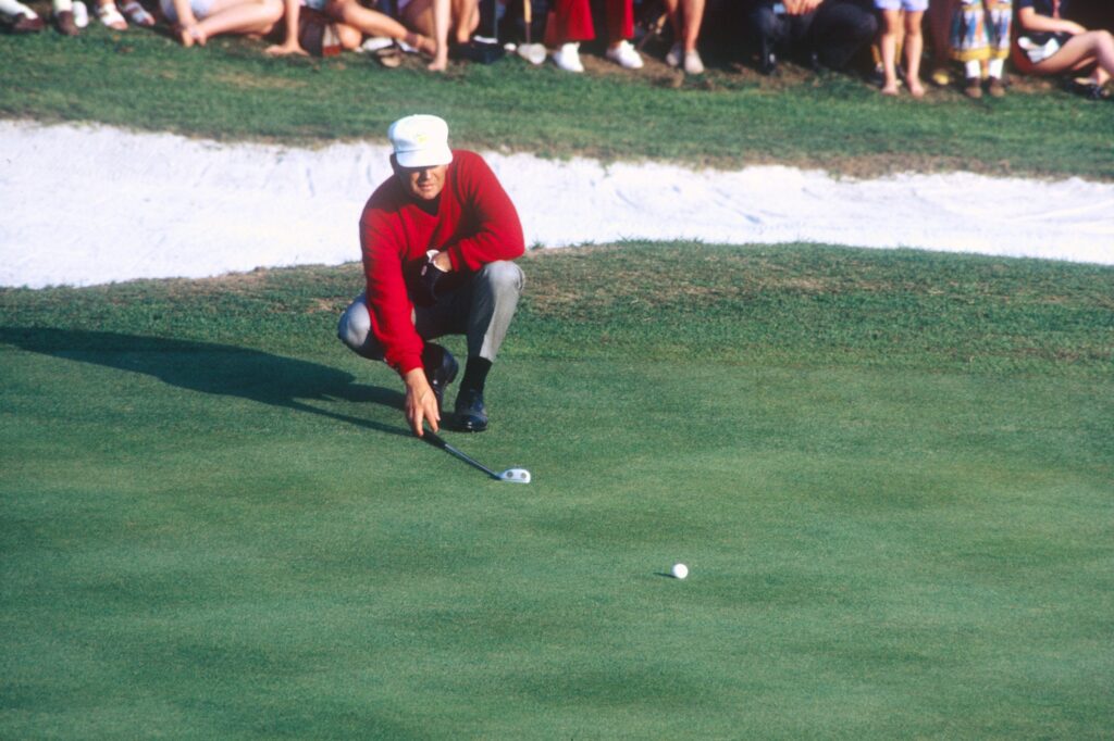 Billy Casper lines up a putt during the 1970 Masters at Augusta National